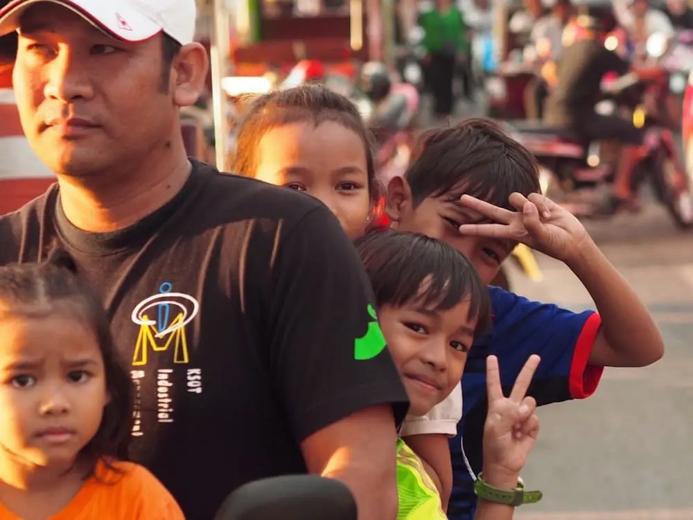 A family of five on a scooter