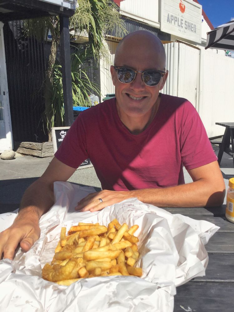 Ian with fish and chips at Mapua Wharf