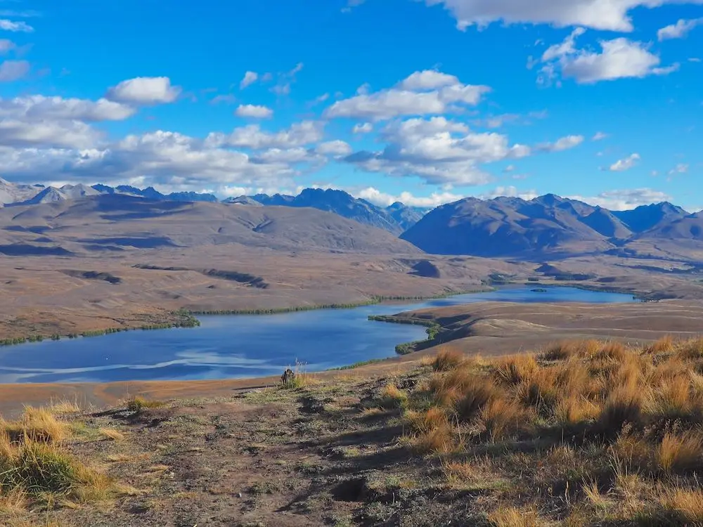 View of the mountains and Lake Tekapo from the summit of Mount John
