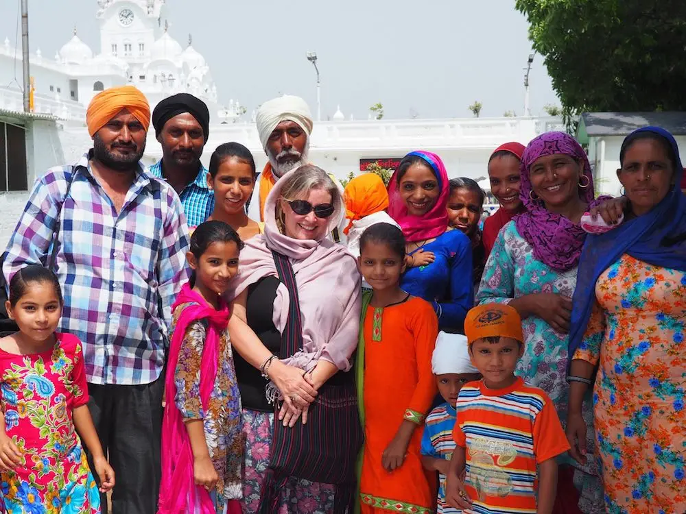 Nicky with a Sikh family at the Golden Temple