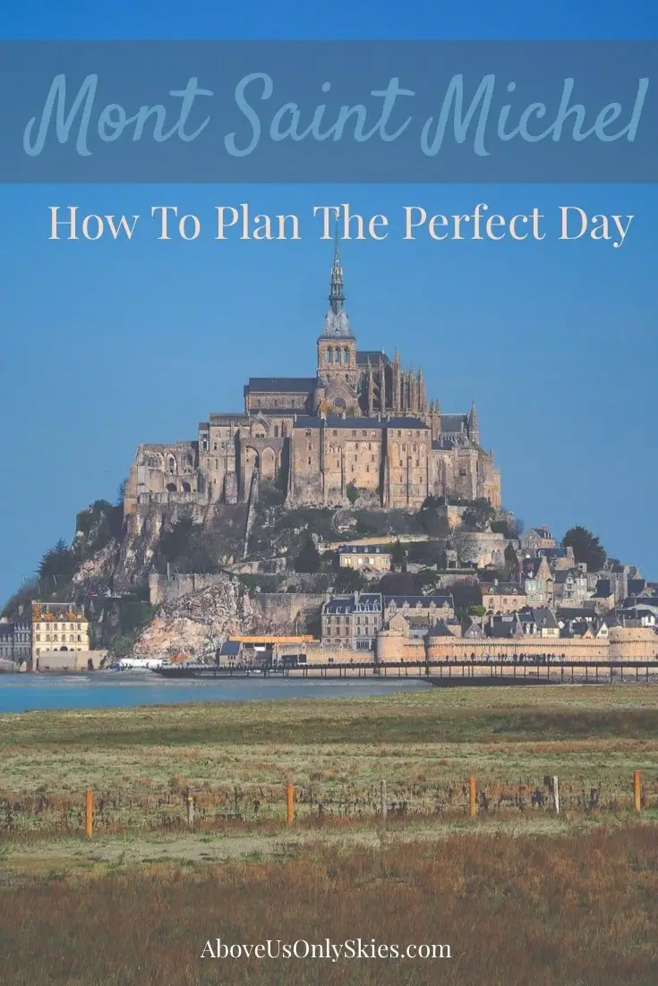 The island of Le Mont Saint-Michel (Mont St Michel) in Normandy, France is the stuff of legend and fairytales. We show you how to plan your trip there, easily done in a day-trip from Paris. And whether you choose to visit at high tide or low, the architecture is magnificent. #montstmichel #montsaintmichel #daytripsfromparis #europetravel #fairytalecastle