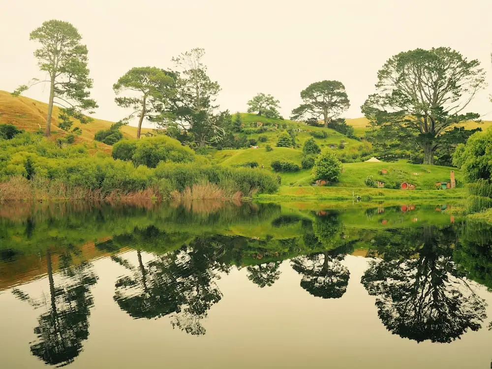 Hobbit houses reflected in the lake