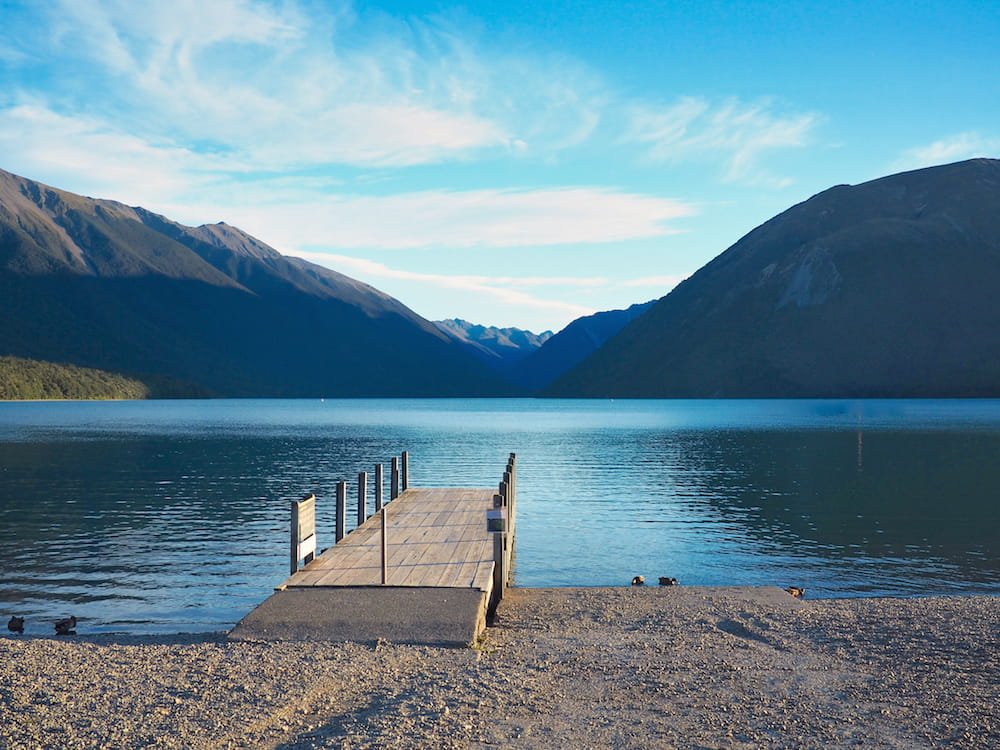 A wooden jetty stretches out on to Lake Rotoiti