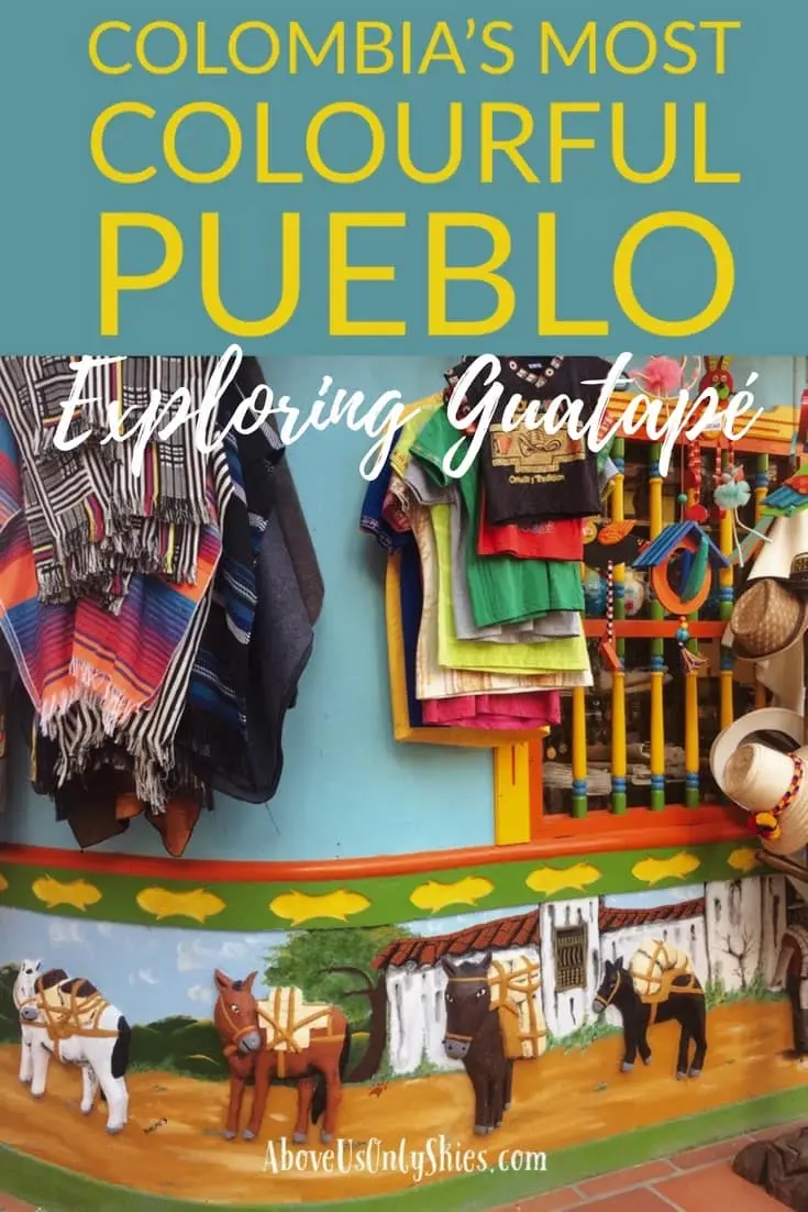 Antioquia in Colombia is famous for its colourful pueblos. And none more so than Guatapé with its colorful friezes, known as zocalos, decorating every building in sight. Along with climbing up the 600+ steps to admire the views of the lake from the top of The Rock (El Peñol), there's plenty to see and do on an overnight visit from Medellín #Guatape #DayTripsFromMedellin #ColombiaPueblo #ColombiaTravel