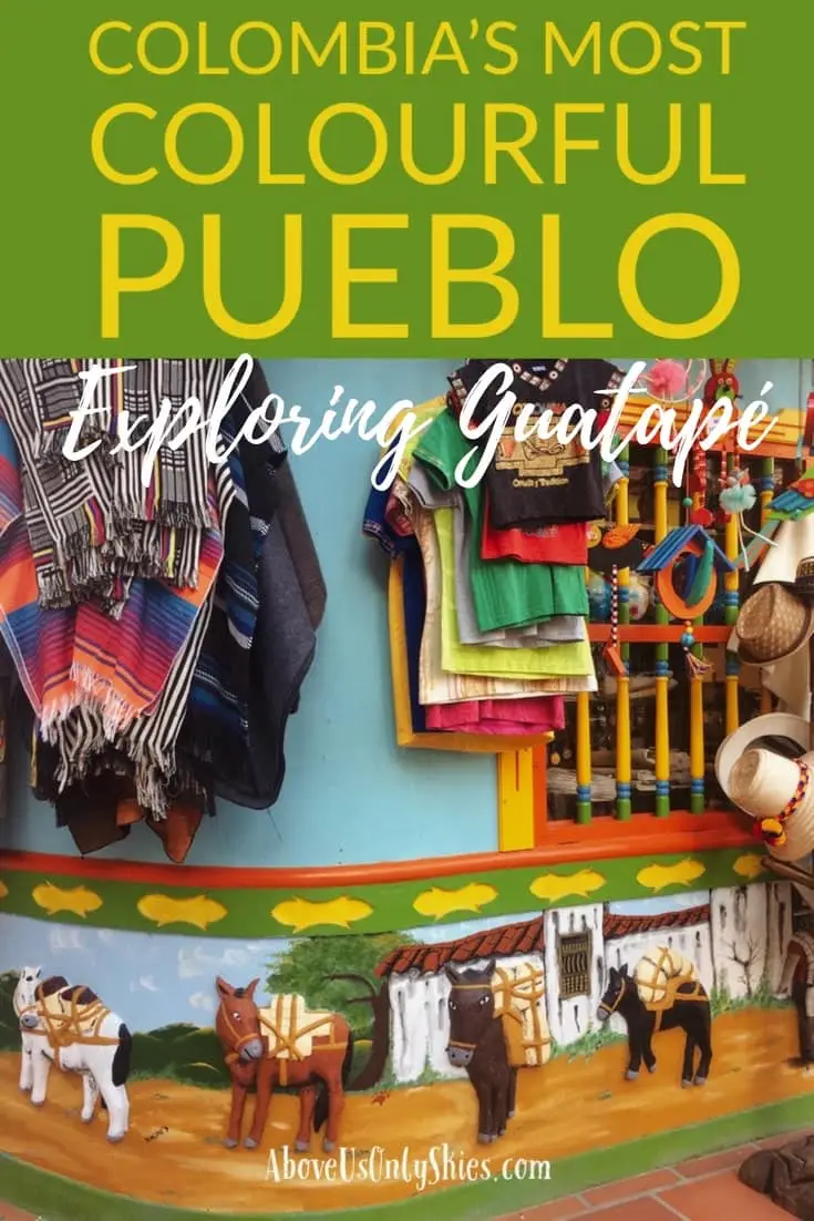 Antioquia in Colombia is famous for its colourful pueblos. And none more so than Guatapé with its colorful friezes, known as zocalos, decorating every building in sight. Along with climbing up the 600+ steps to admire the views of the lake from the top of The Rock (El Peñol), there's plenty to see and do on an overnight visit from Medellín #Guatape #DayTripsFromMedellin #ColombiaPueblo #ColombiaTravel