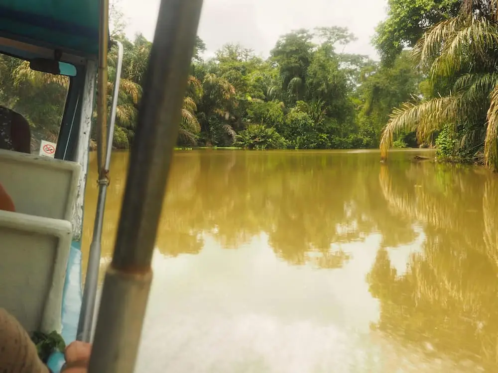 The water taxi blasts through calm water