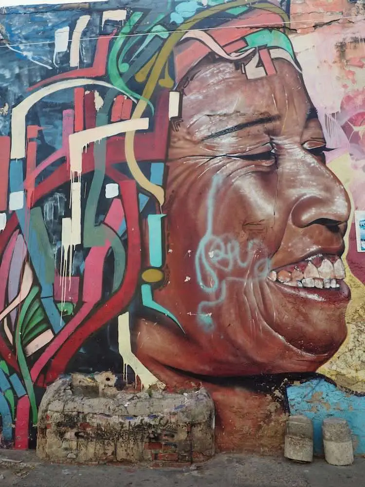 Getsemani street art - laughing woman