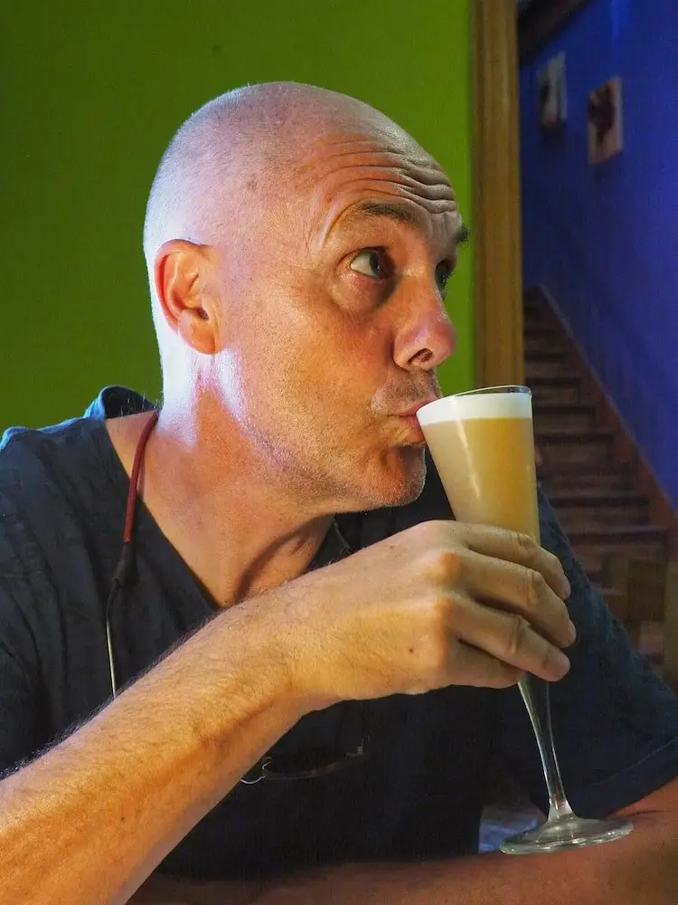 Ian with a black pepper pisco sour