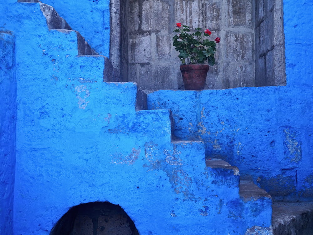Blue steps on a blue wall