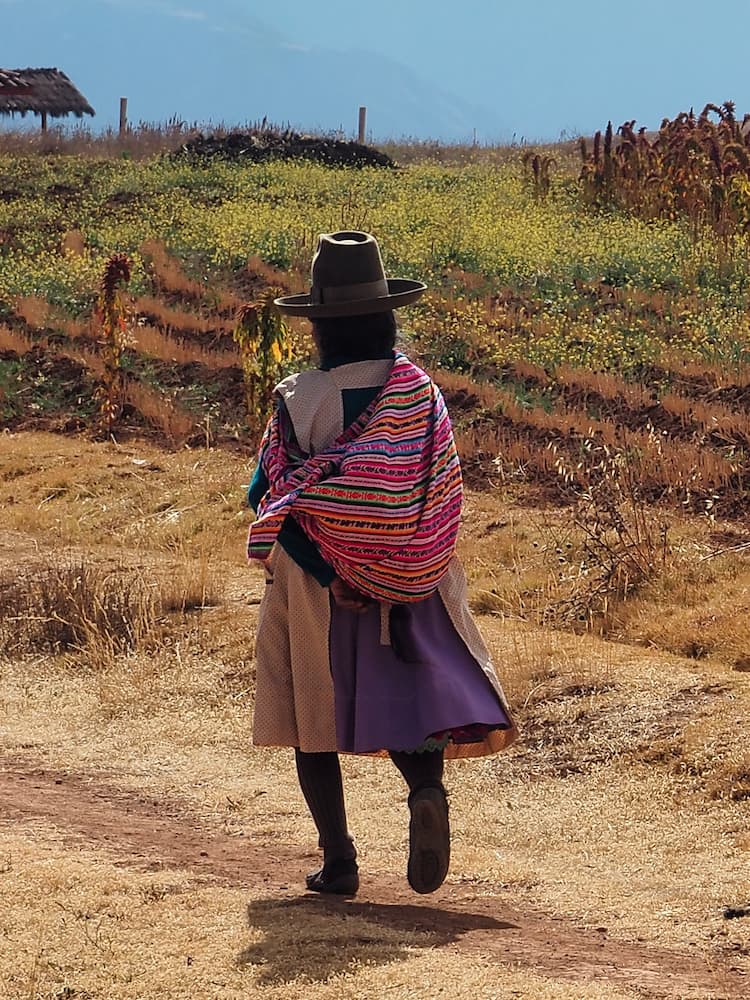 A woman in traditional dress - The Sacred Valley