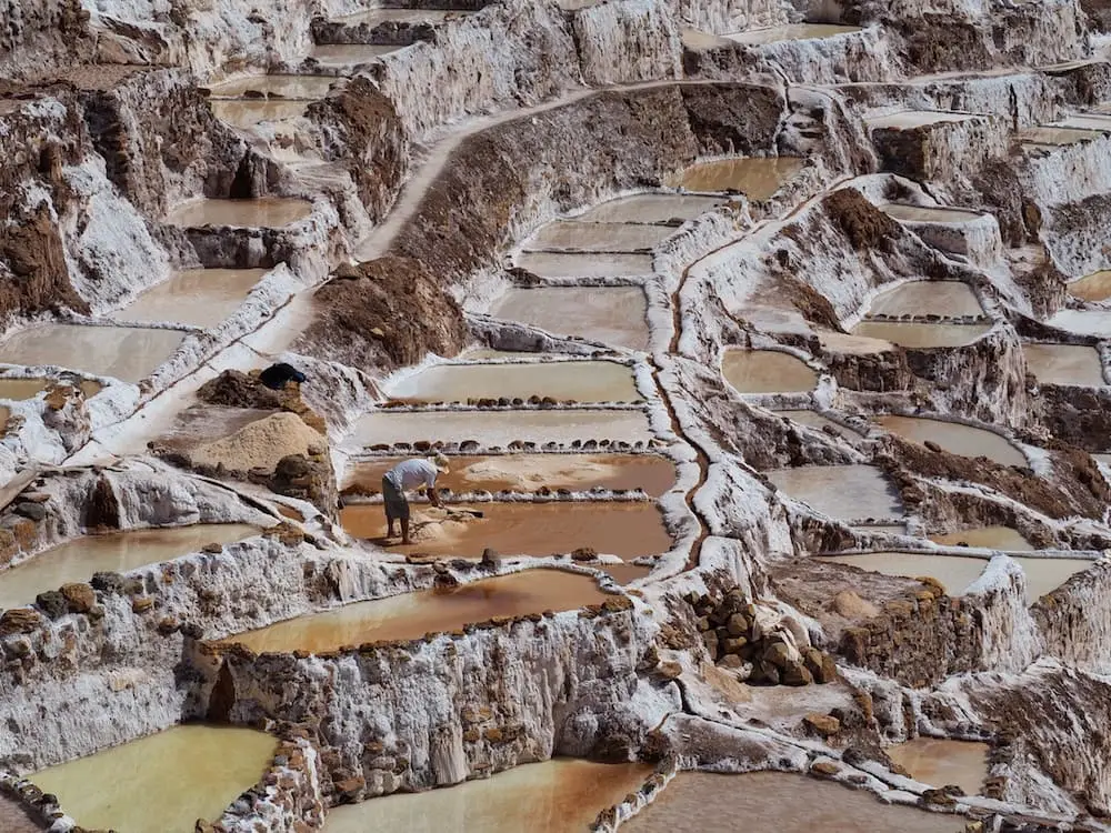 A man works in the salt pools