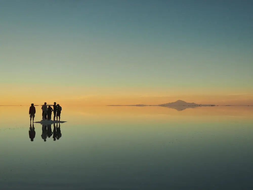 Silhouettes of five people 