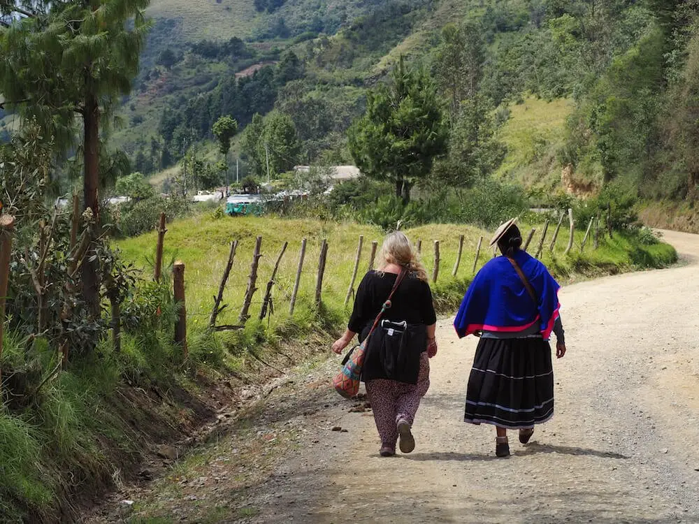 Nicky and Maria walking outside Silvia