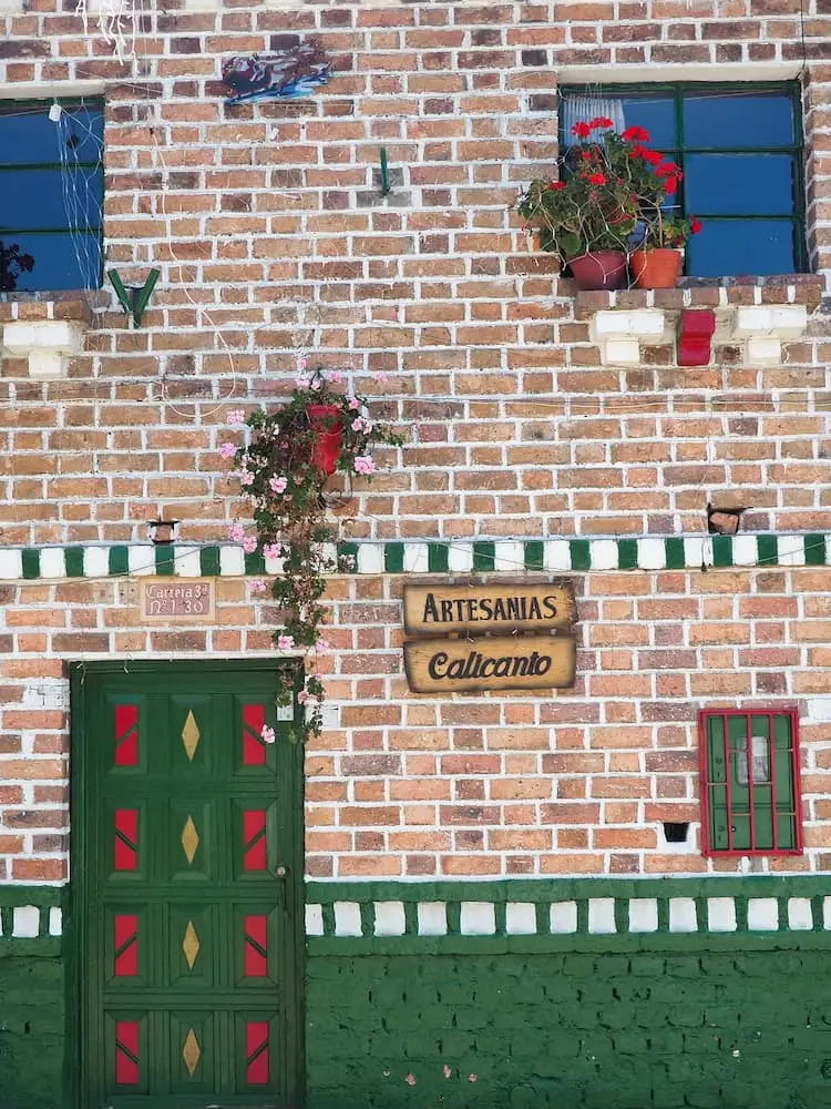 A town house with typical colourings of green and red