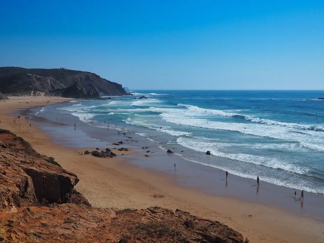 Praia da Armado, Carrapateira. Large beach with people dispersed