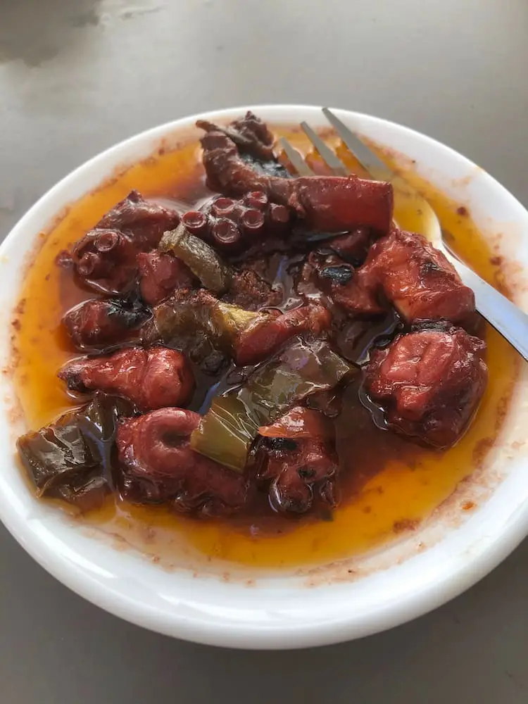 A plate with octopus and sauce