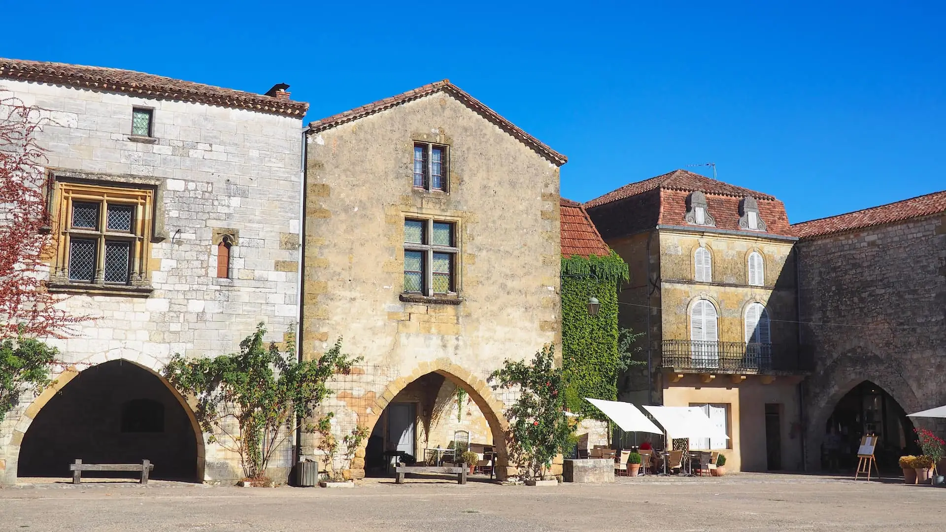 Stone buildings with three archways