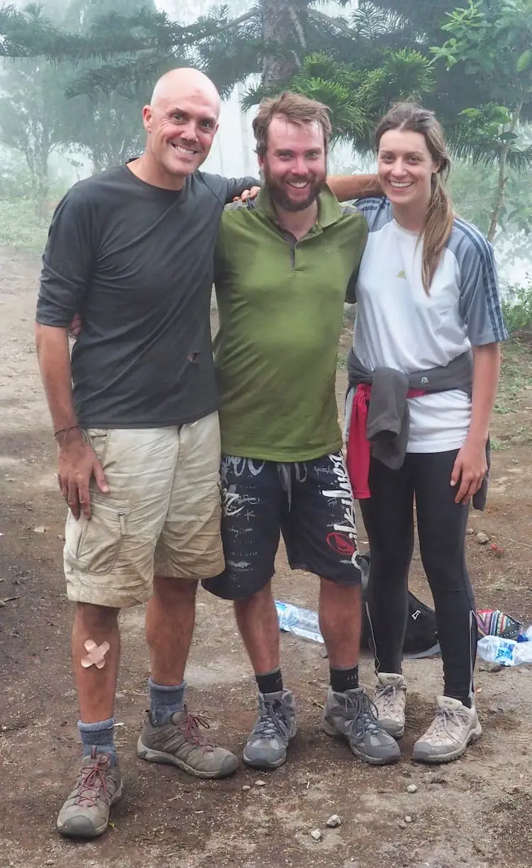 Mount Inerie hike, Flores Three people pose for the camera at the end of a long hike