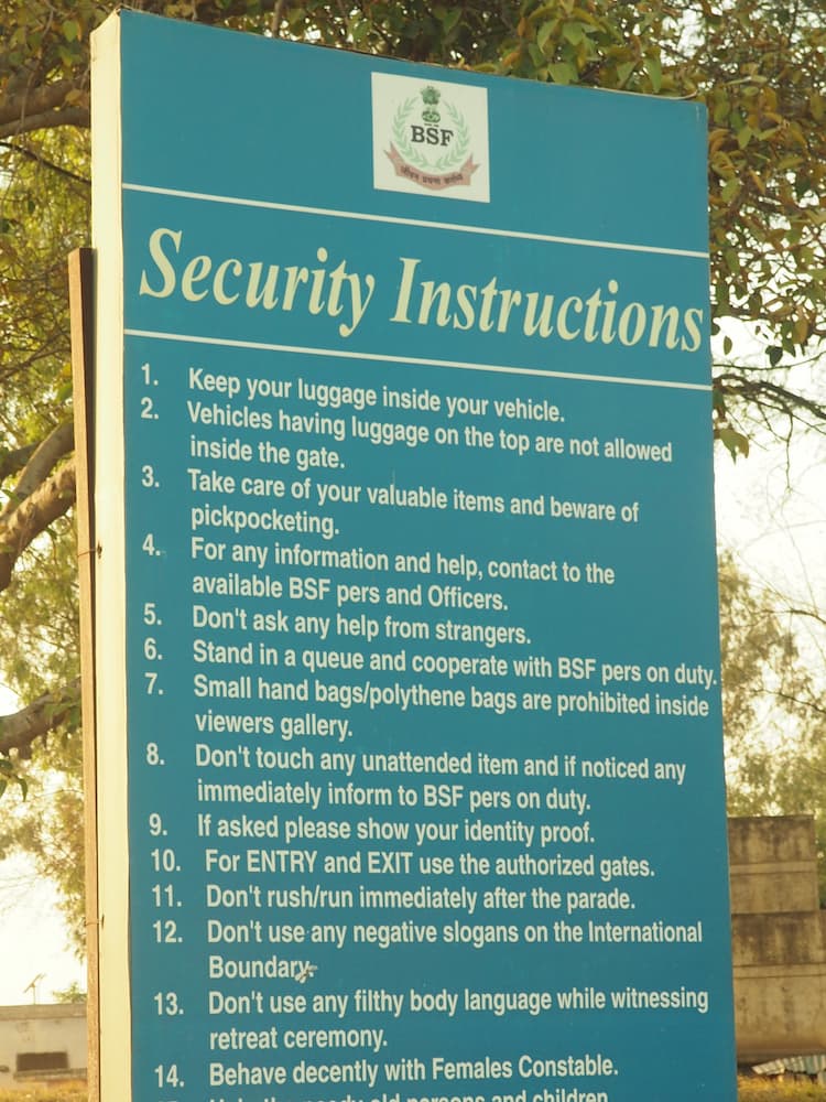 A green sign entitled "Security Instructions" with a list of items below it