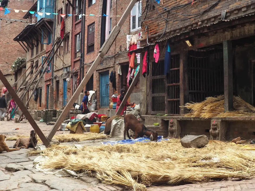 Buildings are propped up with long planks of wood