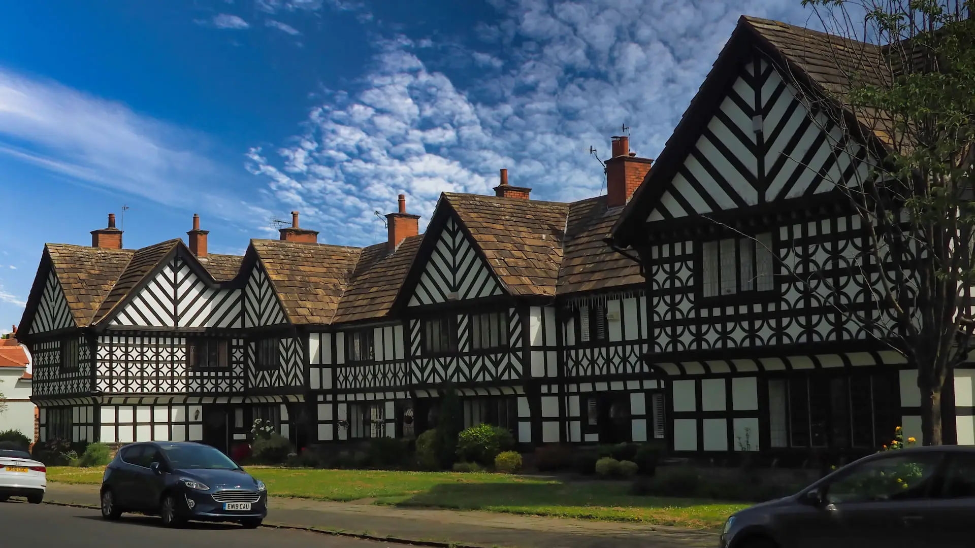 Row of houses with black and white wooden timber on the facias
