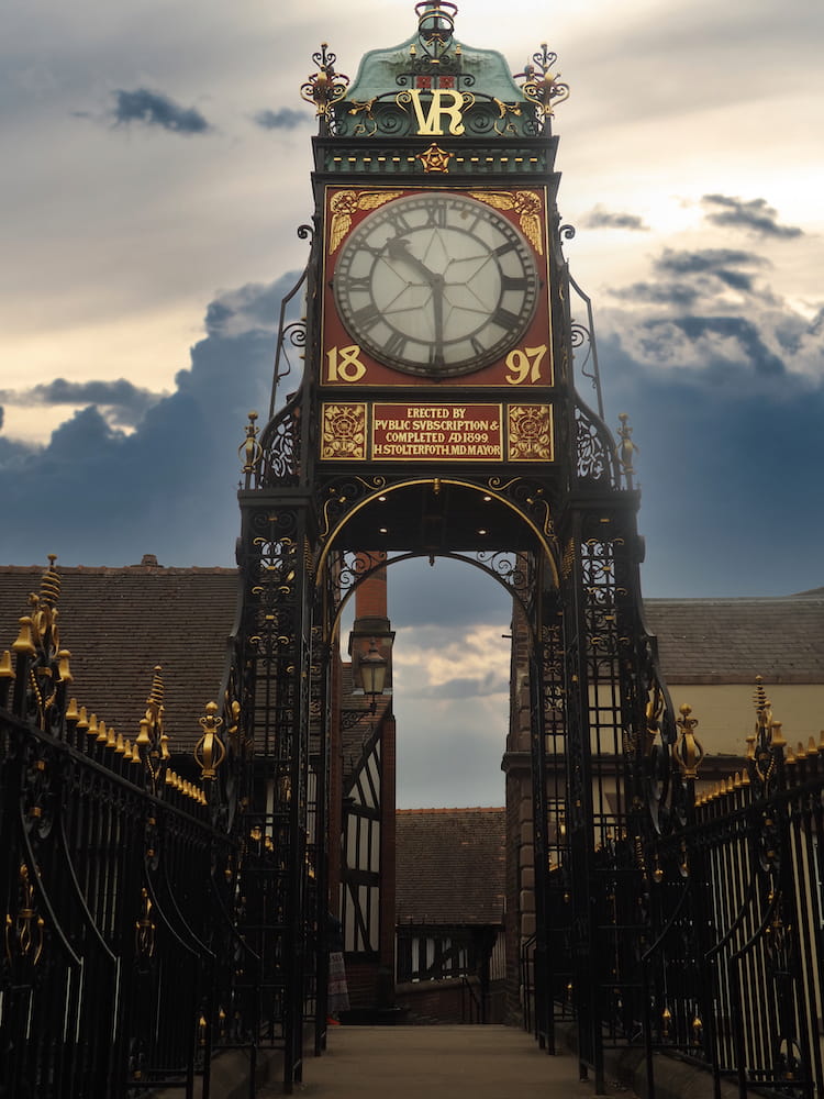 A bridge is topped with a clocktower