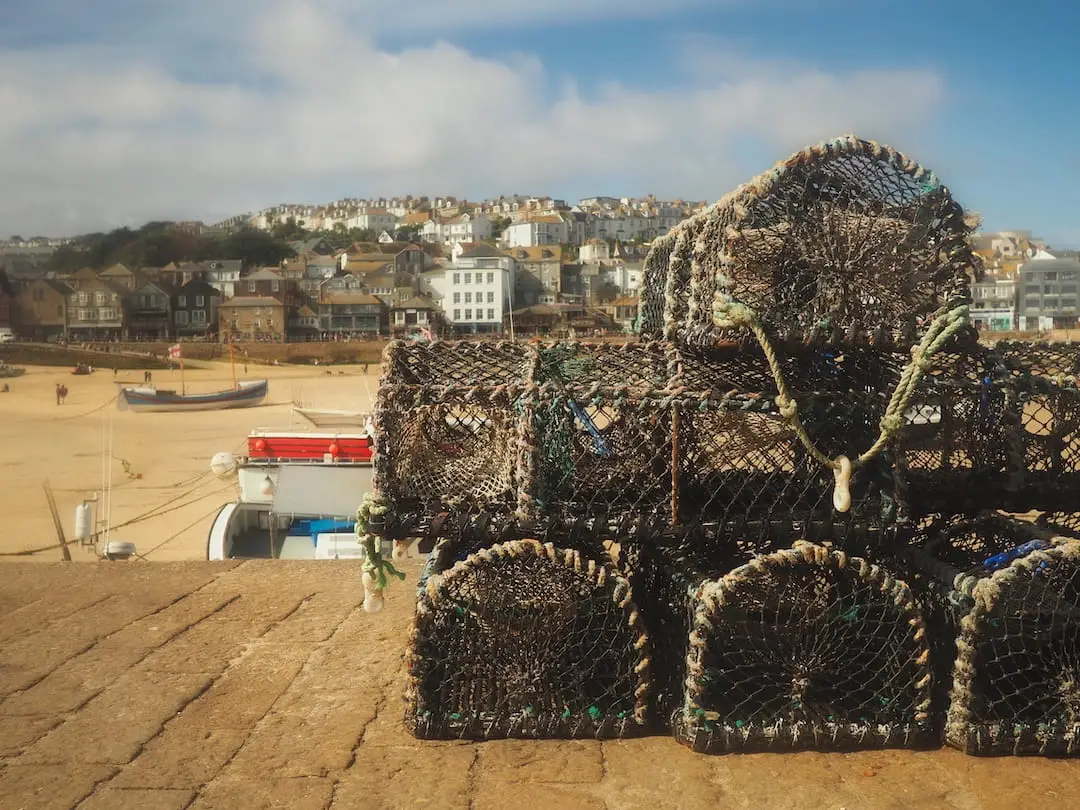 St Ives, Cornwall Lobster pots in front of a beach and port behind