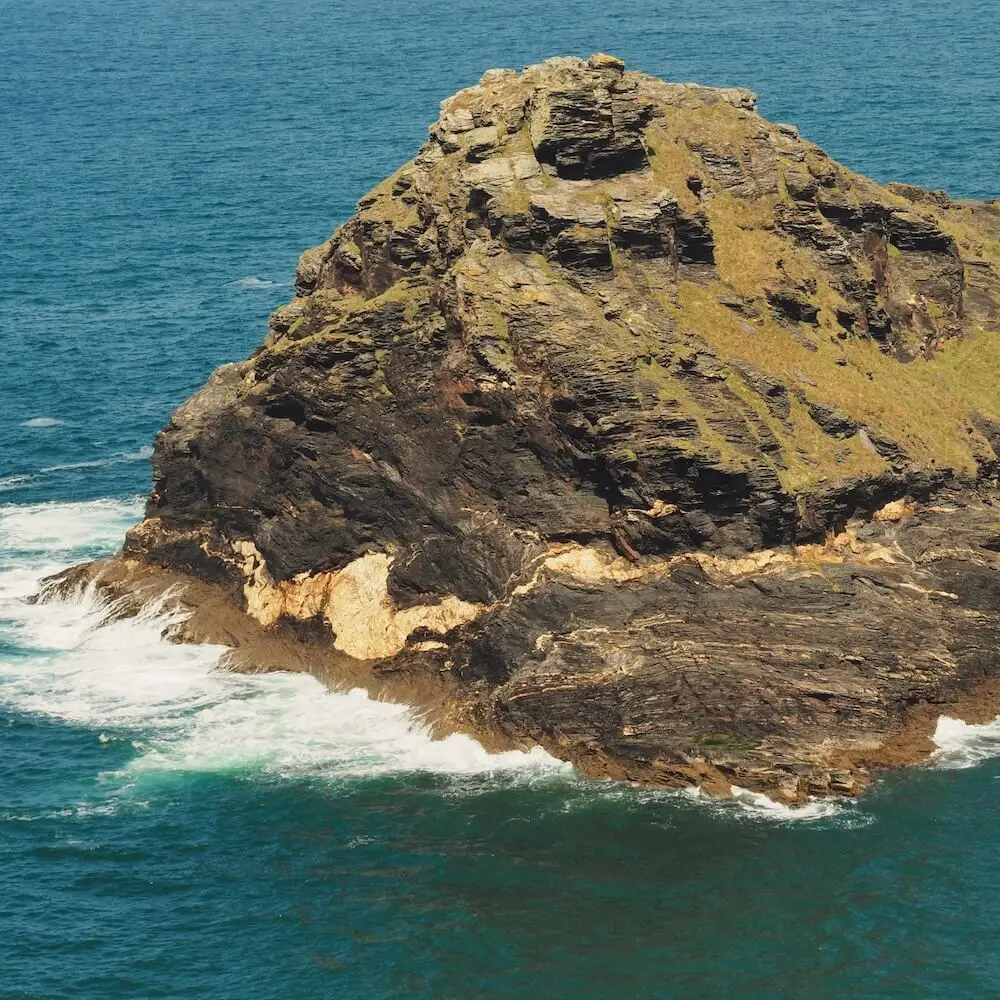 Boscastle - Penally Point A rocky outcrop is battered by waves