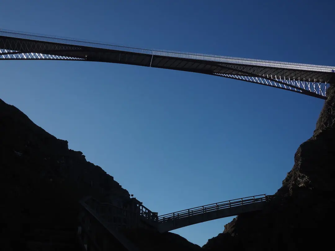 Tintagel island bridge.. Silhouette of a bridge viewed from below