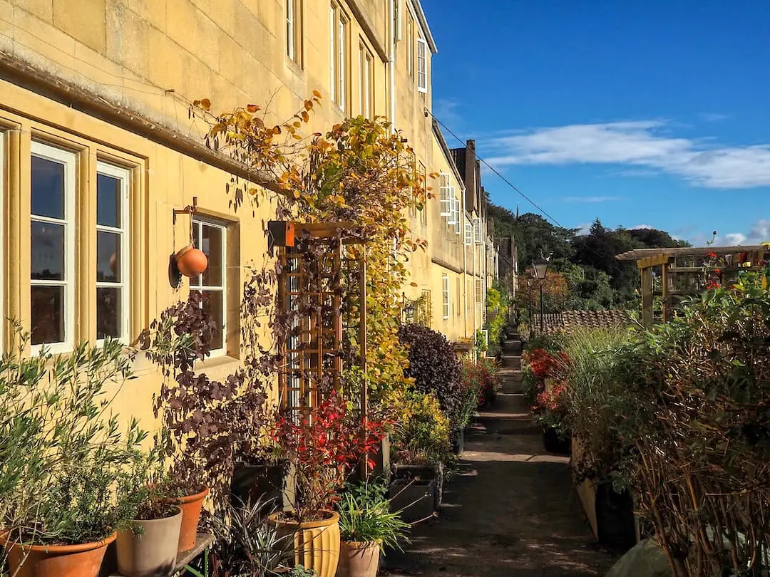 Stone terraced houses with plant pots outside