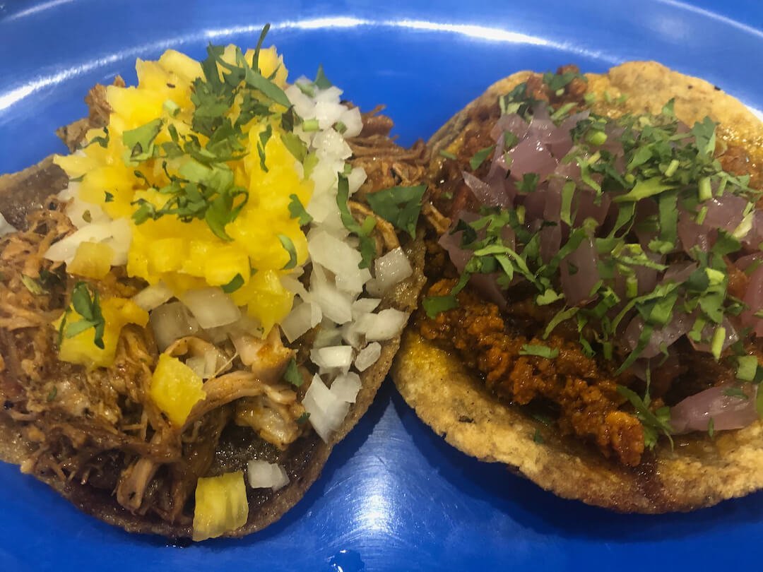 Two panuchos on a plate