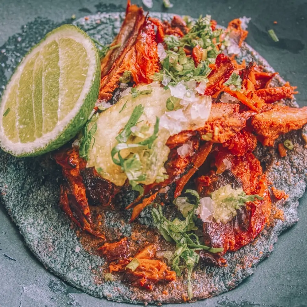 Al Pastor on a blue corn taco