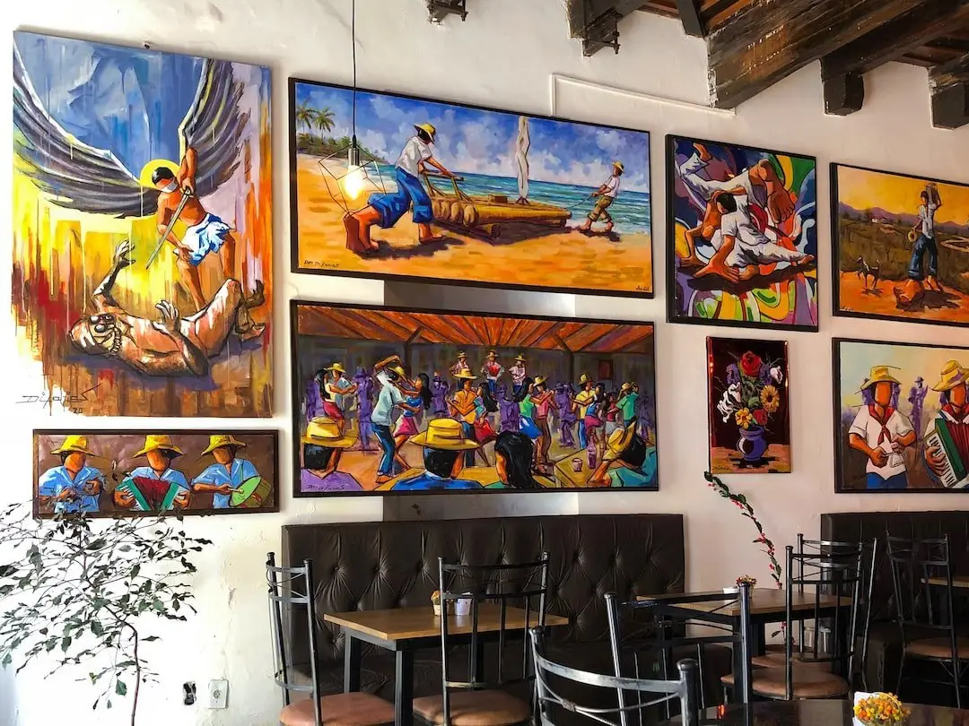 Rua do Amparo - Cafe com Arte - Olinda Art on the wall of Cafe com Arte