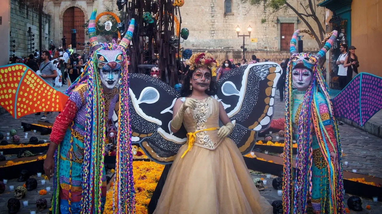 Colourful Day of the Dead costume - Oaxaca A woman dressed in a wildly colourful costume