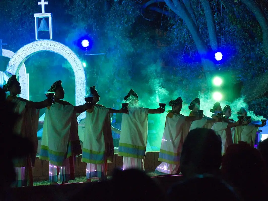 Day of the Dead concert outside Santo Domingo Church - Oaxaca A stage lined with perfomers in white gowns