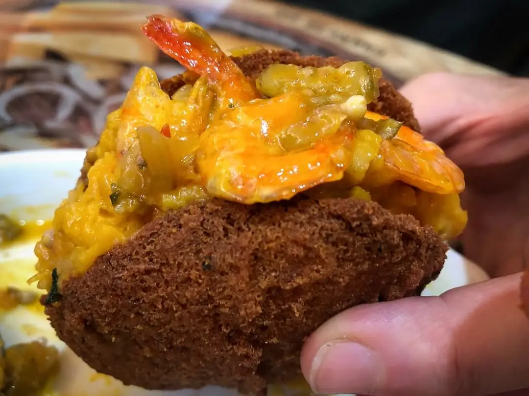 A split patty filled with shrimp and spicy paste