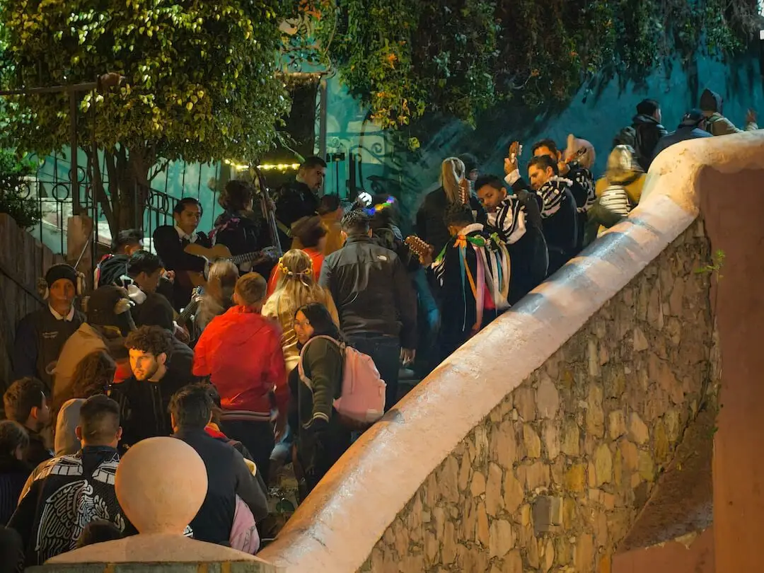 A group of people being entertained in a passageway