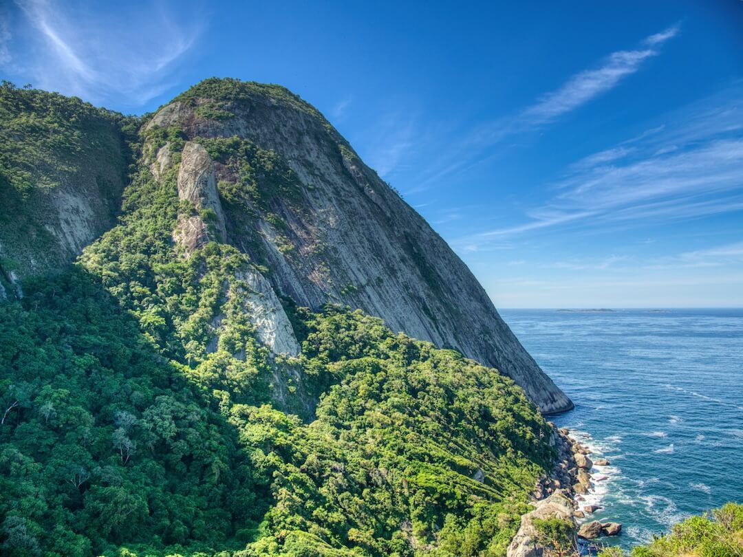 A cliff shaped like an elephant's head drops to the sea below